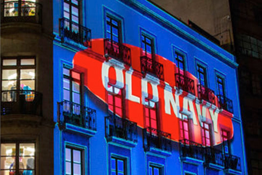 old navy logo projected on the side of a building